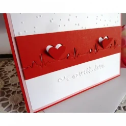 ﻿ ﻿﻿Karte zum Valentinstag mit Herzschlagkurve