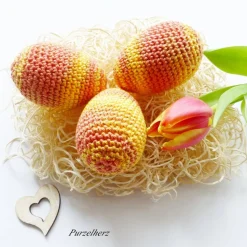 3 umhäkelte Ostereier zur Tischdeko - Gastgeschenk,Ostern,Muttertag,Dekoeier,festlich,modern,gelb,pfirsich