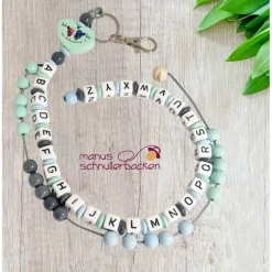 ABC-Rechenkette mit Motivherz "Ich bin ein Schulkind" in Grau, Mint, Hellblau