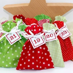Adventskalender / Säckchen zum befüllen / Stoffsäckchen mit Zahlen rot grün