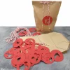Adventskalender zum Befüllen – 24 Kraftpapierbeutel mit roten Zahlenanhängern & Kordeln