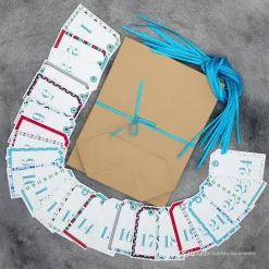 Adventskalender zum Befüllen – 24 Kraftpapiertüten mit Zahlenanhängern & Satinbändern