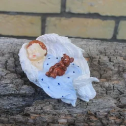 Baby Junge mit Teddy in Engelsflügel gebettet, handbemalt