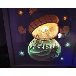 Beleuchteter Bilderrahm mit Weihnachtsmotiv und Farbwechsel.