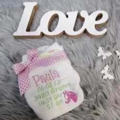 Bestickte Windel mit Spruch: Du wirst Tante