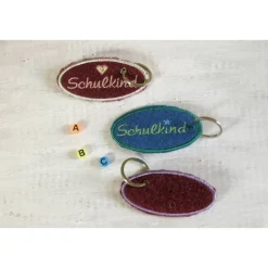 Bestickter Schlüsselanhänger aus Filz 