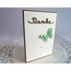 Dankekarte mit Hintergrundprägung und Schmetterling