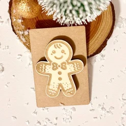 Deko-Figur Lebkuchenmann, Holz auf Kraftpapier