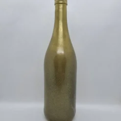 Dekorative Flasche in Kupfer mit Glitzereffekt. Perfekte Tischdekoration für die nächste Feier.