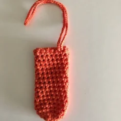 Eine Eierschleuder / Eiernetz / Ostereierschleuder / Ostereiernetz orange