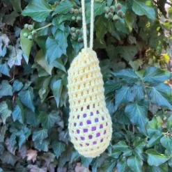 Eine Eierschleuder / Eiernetz / Ostereierschleuder / Ostereiernetz tgelb