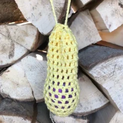 Eine Eierschleuder / Eiernetz / Ostereierschleuder / Ostereiernetz tgelb