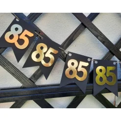 Elegante Girlande zum 85. Geburtstag in Gold und Schwarz. Angesagte Trendfarben! Tolle Papierdeko zum 50. Wimpelkette zu