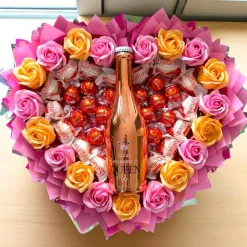 Essbarer Pralinen-Strauß mit Lindor, Raffaello & dekorativer Flasche „Today my name is Queen“