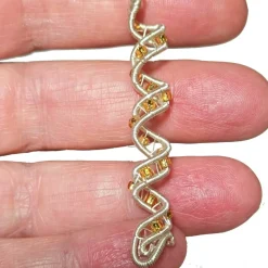 Funkelnde Spiralperlen Set handgewebt silberfarben Glasperlen goldfarben bicolor handmade Brautschmuck Zopfperle