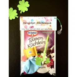 Geburtstagsgeschenktüte, Kuchenmischung verpackt mit Kerze, Konfetti und Luftballon, Geburtstagsüberraschung