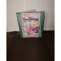 Geburtstagskarte für eine Frau mit rosafarbenen Blumen