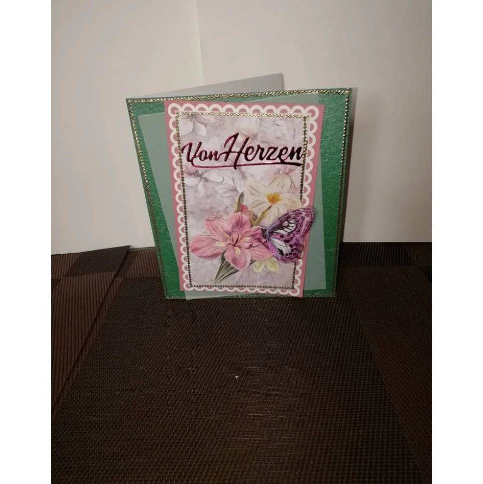 Geburtstagskarte für eine Frau mit rosafarbenen Blumen