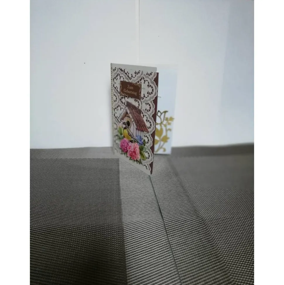 Geburtstagskarte in cremebraun mit einem Singvogel