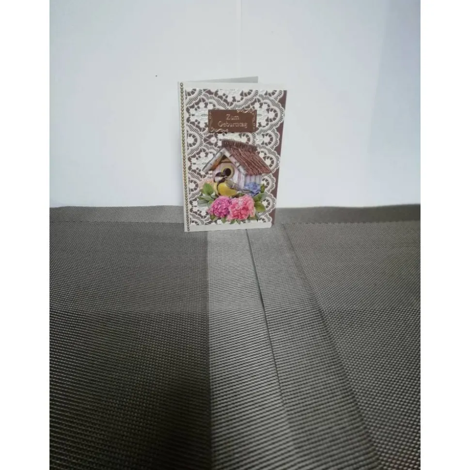 Geburtstagskarte in cremebraun mit einem Singvogel