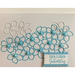 Geburtstagskarte mit Blumen und bunten Perlen