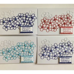 Geburtstagskarte mit Blumen und bunten Perlen