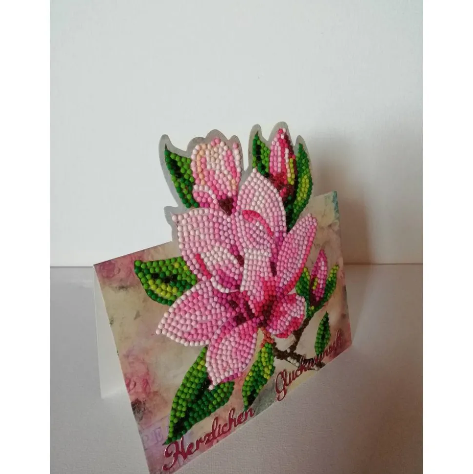 Geburtstagskarte mit rosafarbenen Blumen