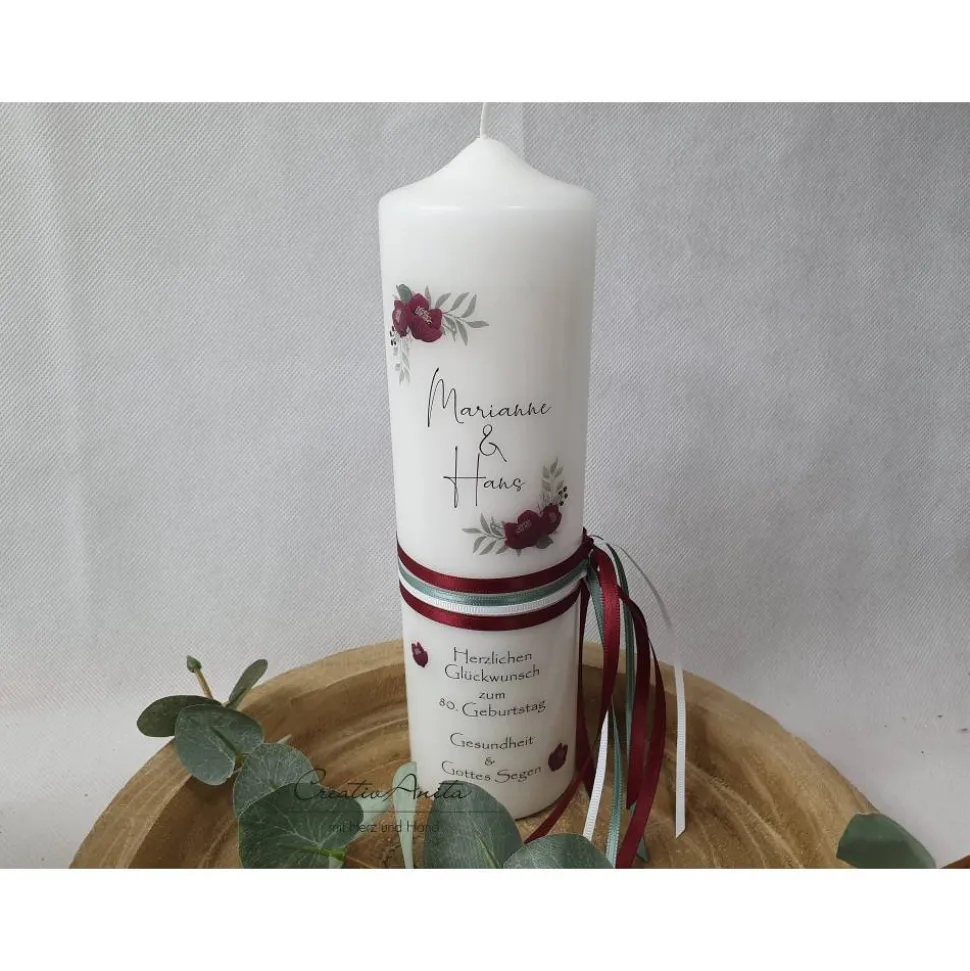 Geburtstagskerze mit Blumen in bordeaux und Schleifenbänder