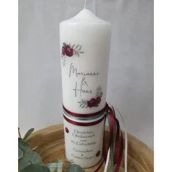 Geburtstagskerze mit Blumen in bordeaux und Schleifenbänder