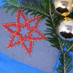geklöppelter Stern 3 rot-gold