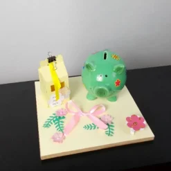 Geldgeschenk Geburtstag mit Sparschwein in gelb grün