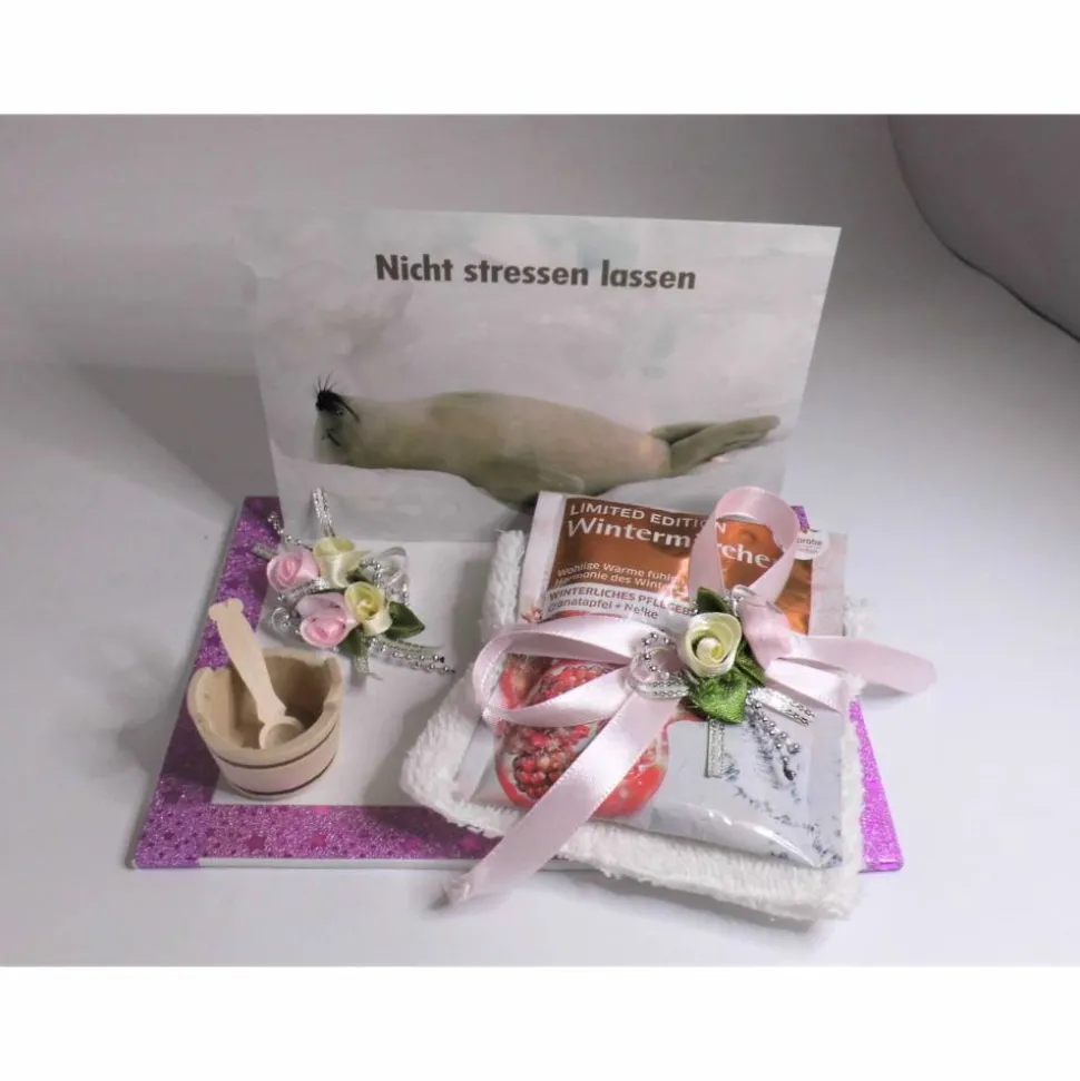 Geldgeschenk Geburtstag: Wellness Gutschein & kreative Verpackung mit Robben-Postkarte