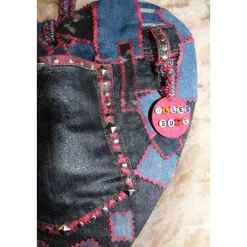 Geldgeschenk zu Valentinstag Muttertag oder Vatertag JEANSHERZ Collage, gestaltet auf einem herzförmigen Bambusbrett