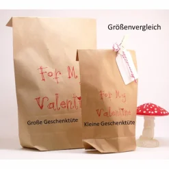 Geschenktüten-Set mit Spruch Vielleicht bedeutet Liebe... von E. Barrett-Browning mit Geschenkanhänger aus Papier und Ko