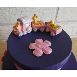 Geschenkverpackung Torte mit Eisenbahn und Schaukelpferd - rosa-lila