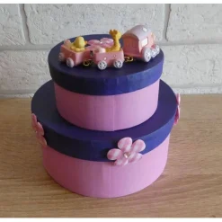 Geschenkverpackung Torte mit Eisenbahn und Schaukelpferd - rosa-lila