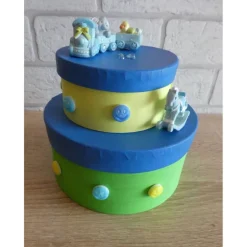 Geschenkverpackung Torte mit Eisenbahn und Schaukelpferd - blau, gelb, grün, türkis