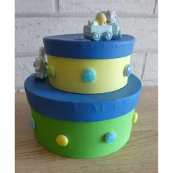 Geschenkverpackung Torte mit Eisenbahn und Schaukelpferd - blau, gelb, grün, türkis