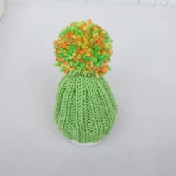 Gestrickte kleine Bommelmützen als Eierwärmer  Set aus 4 Stück  Gelb Grün Orange Frühling Ostern
