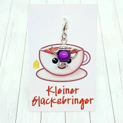 Glücksbringer Kanne silberfarben/violett – Charm für Tee- & Kaffee-Liebhaber