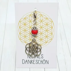 Glücksbringer Same des Lebens Anhänger silberfarben/rot mit roter 3D-Acrylperle und Karabiner