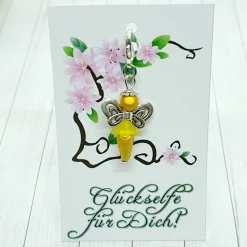 Glücksbringer Schmetterlingselfe silberfarben/gelb – Zauberhafter Anhänger & Geschenk