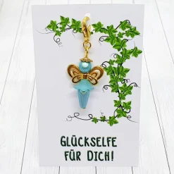 Glücksbringer Schmetterlingselfe goldfarben/türkis – Zauberhafter Anhänger mit 3D-Perlen