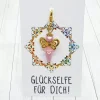 Glücksbringer Schmetterlingselfe goldfarben/rosa – zauberhafter Anhänger mit 3D-Perlen