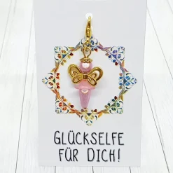 Glücksbringer Schmetterlingselfe goldfarben/rosa – zauberhafter Anhänger mit 3D-Perlen