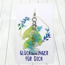 Glücksbringer Taschenbaumler „Zarte Blumen“ türkis – Verspielter Anhänger mit 10 Acrylblüten & Karabiner