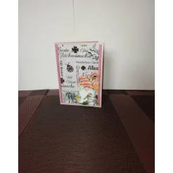 Glückwunschkarte für eine Frau altrosa mit einem kleinen Wichtel