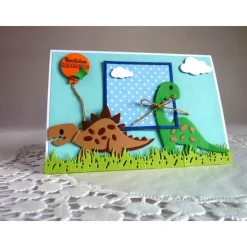 Glückwunschkarte mit Dinosaurier in hellblau/blau für einen Jungen.