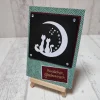 Glückwunschkarte mit Katzen auf Mond