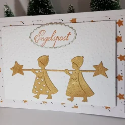 goldene Engel bringen Weihnachts-Sterne handgefertigte Weihnachtskarte mit Grüßen